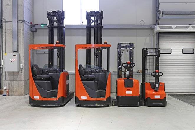 forklifts in action at a factory